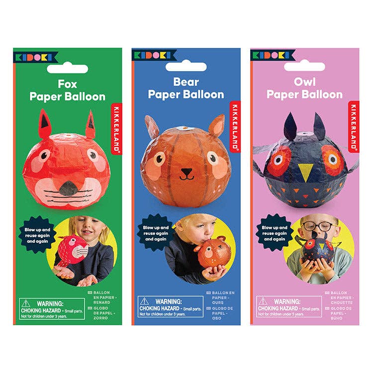 Three packages of Kikkerland paper balloons shaped like a fox, bear, and owl on colorful backgrounds.
