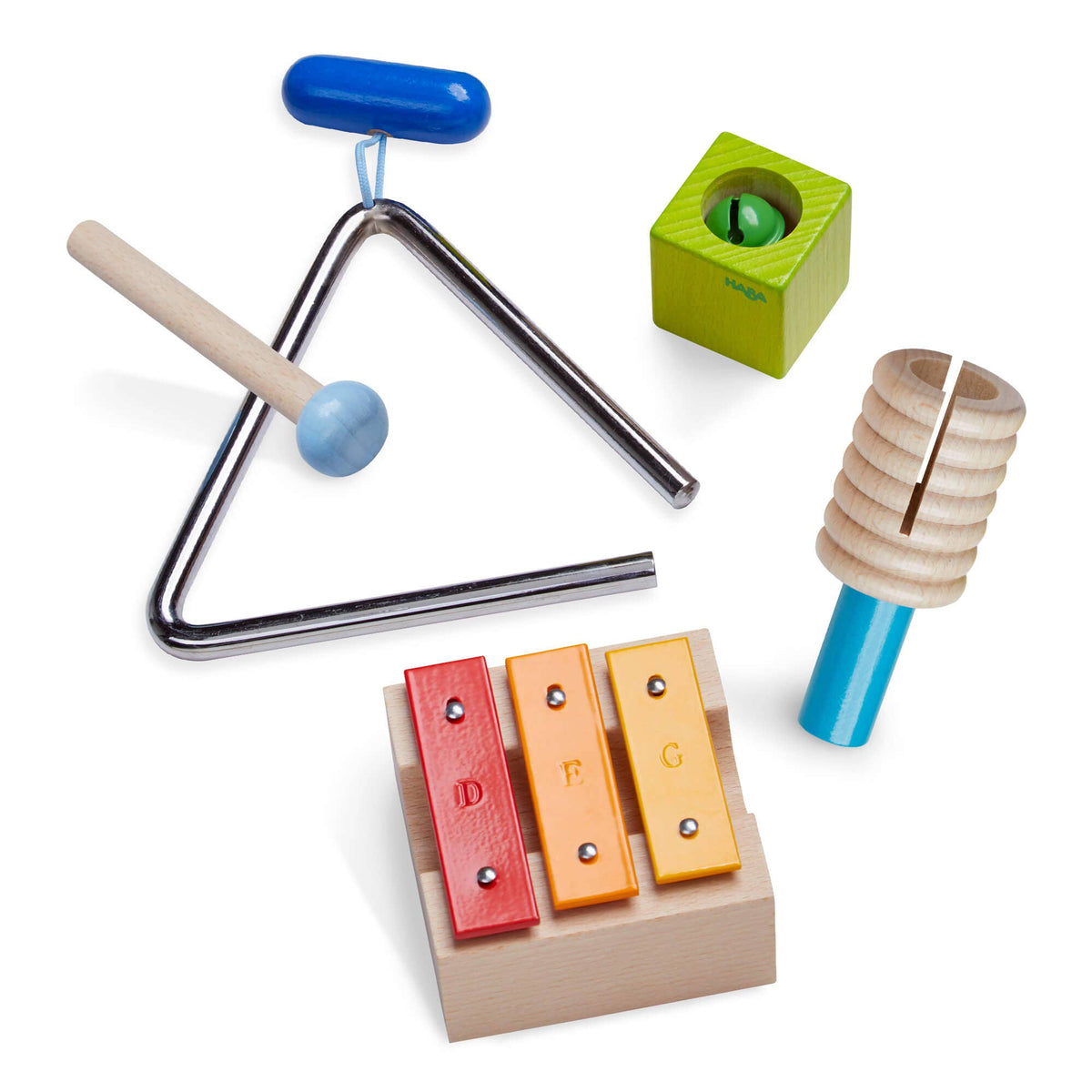 Set of colorful children&#39;s musical instruments on a white background
