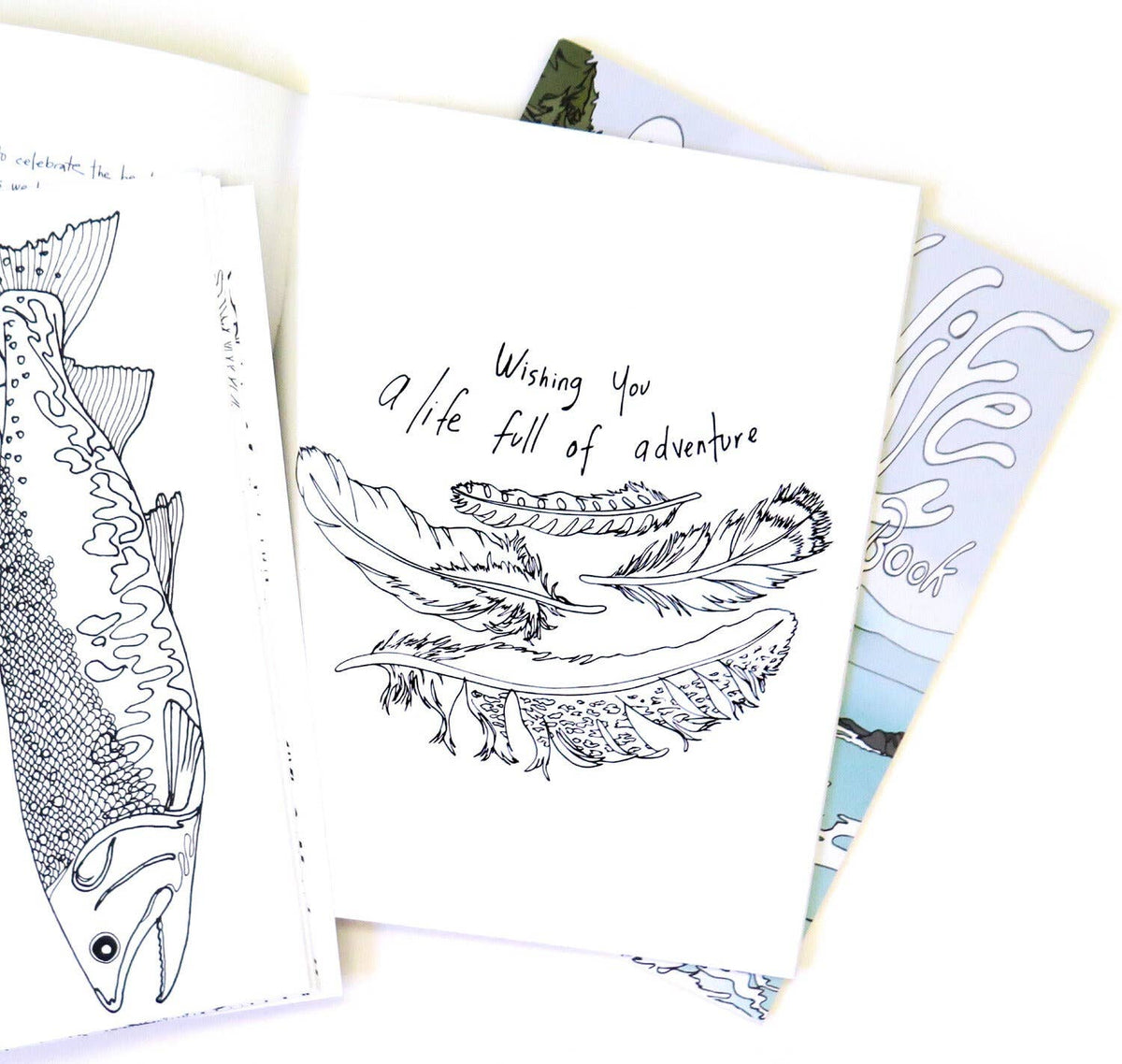 Three greeting cards with different designs on a white background