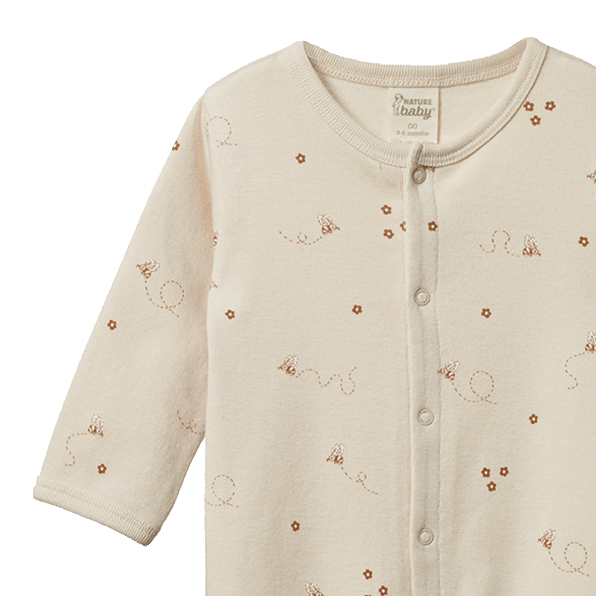 Beige baby pajama  with floral patterns on a white background