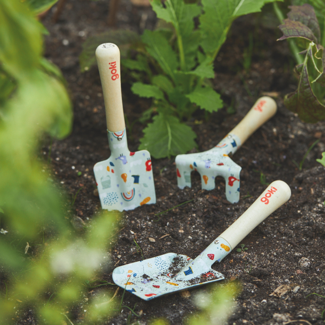 Goki children's garden tool set packaging with tools and colorful design.