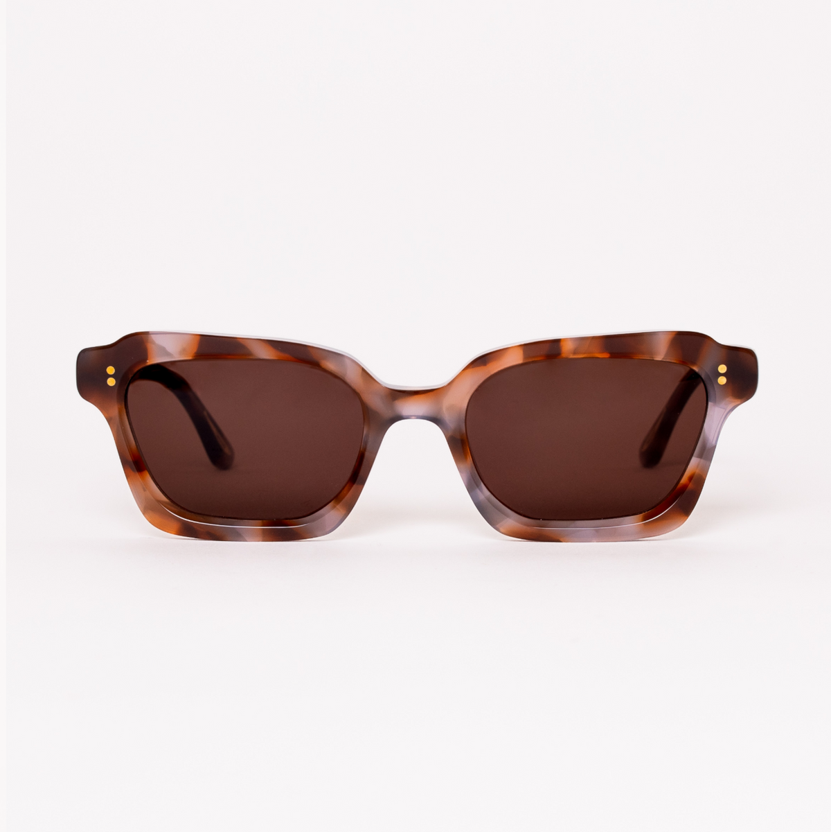 Sunglasses with tortoiseshell frame and brown lenses on a white background