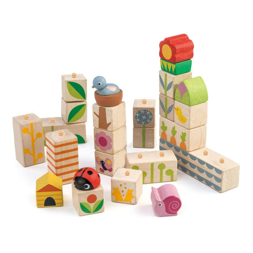 Set of colorful wooden blocks with animal and nature designs on a white background