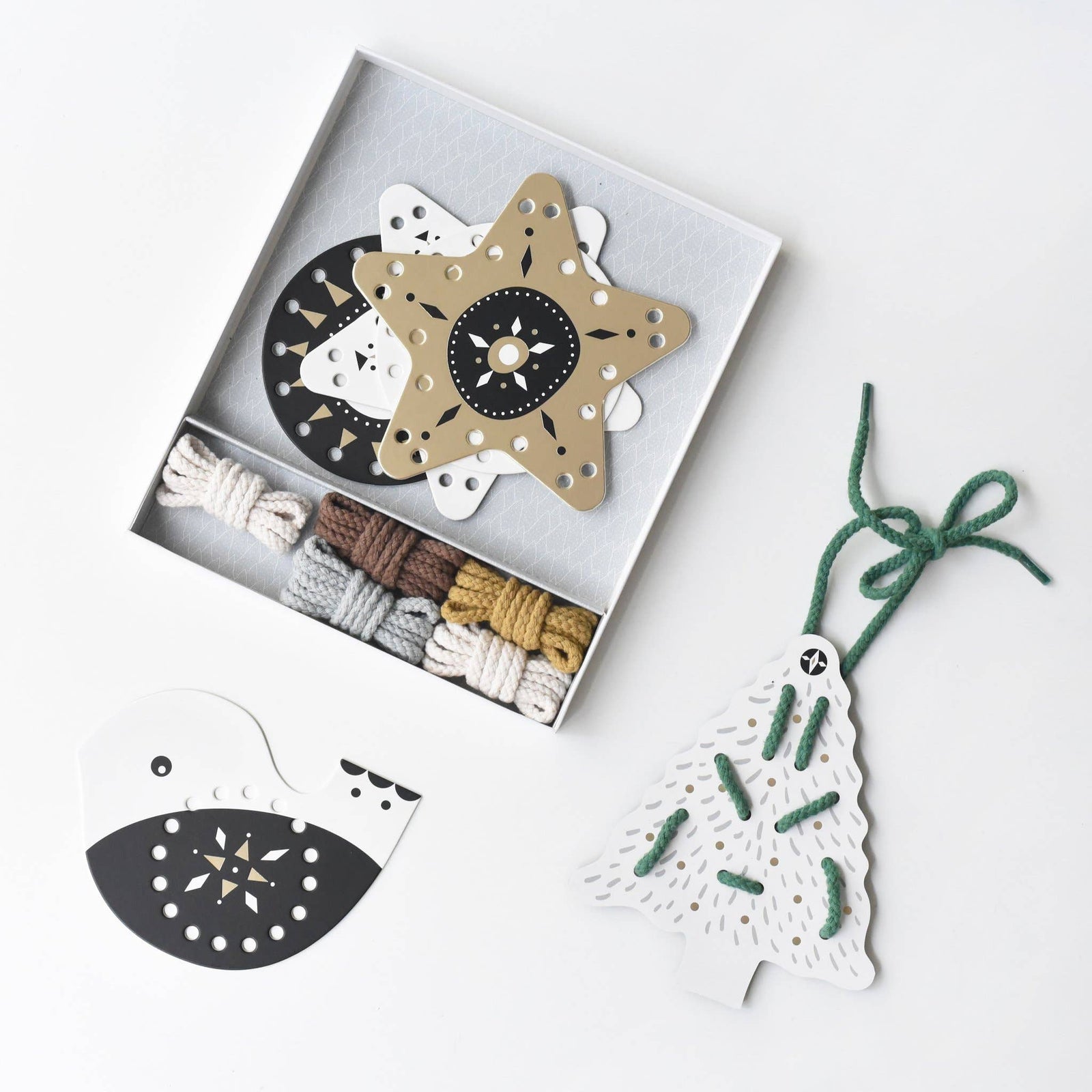 Lacing ornaments with packaging on a white background
