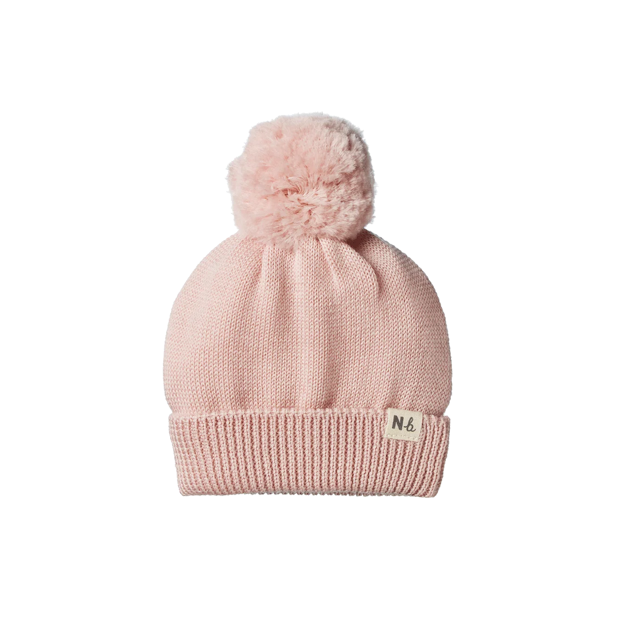 A light pink knit pom-pom beanie with a ribbed cuff and a small cream-colored brand tag on the side, shown against a plain white background.