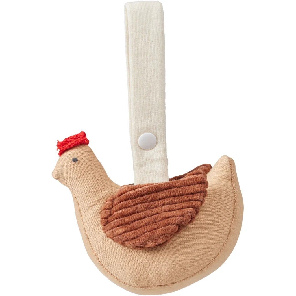 Plush toy shaped like a chicken with a red comb on a white background
