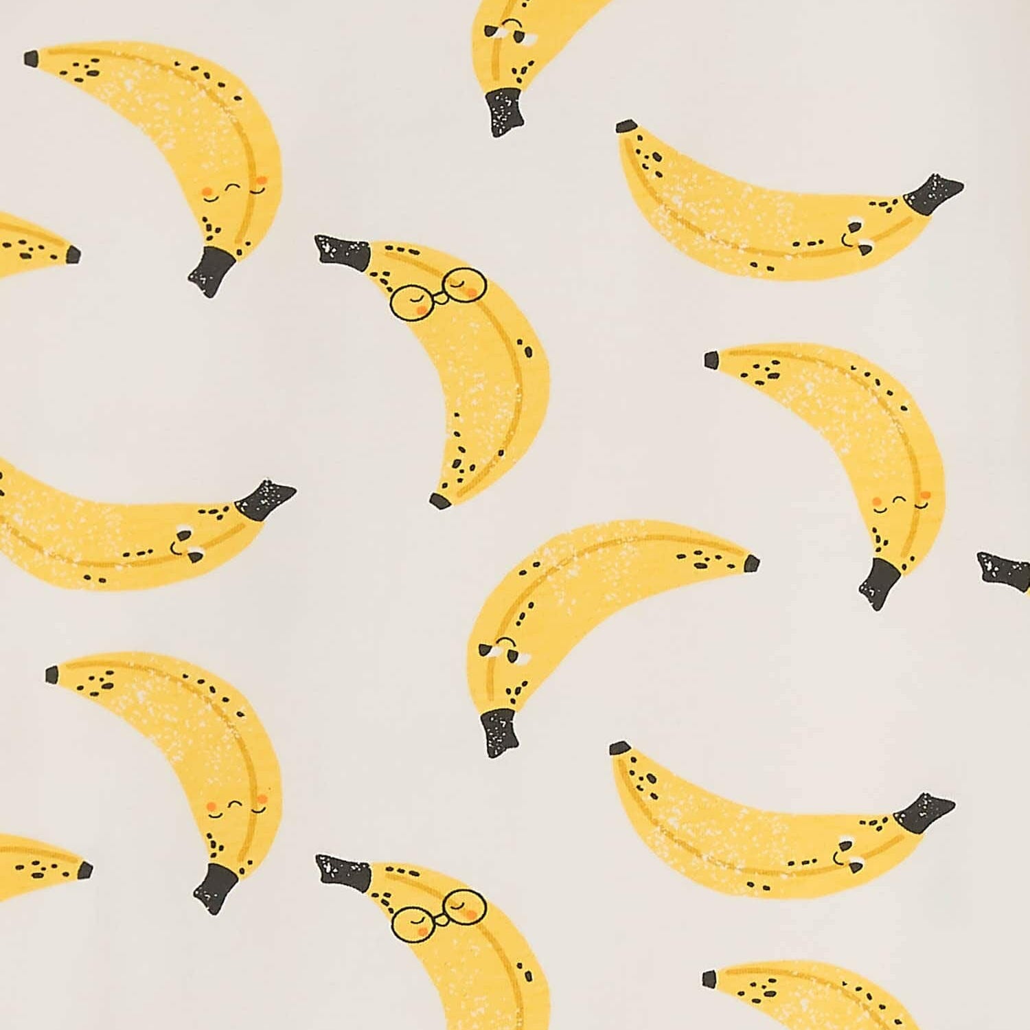 Teething ring with banana-patterned ears on a white background