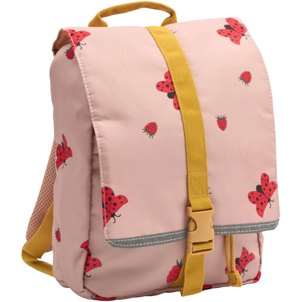 Pink children's backpack with ladybug pattern and yellow straps on a white background