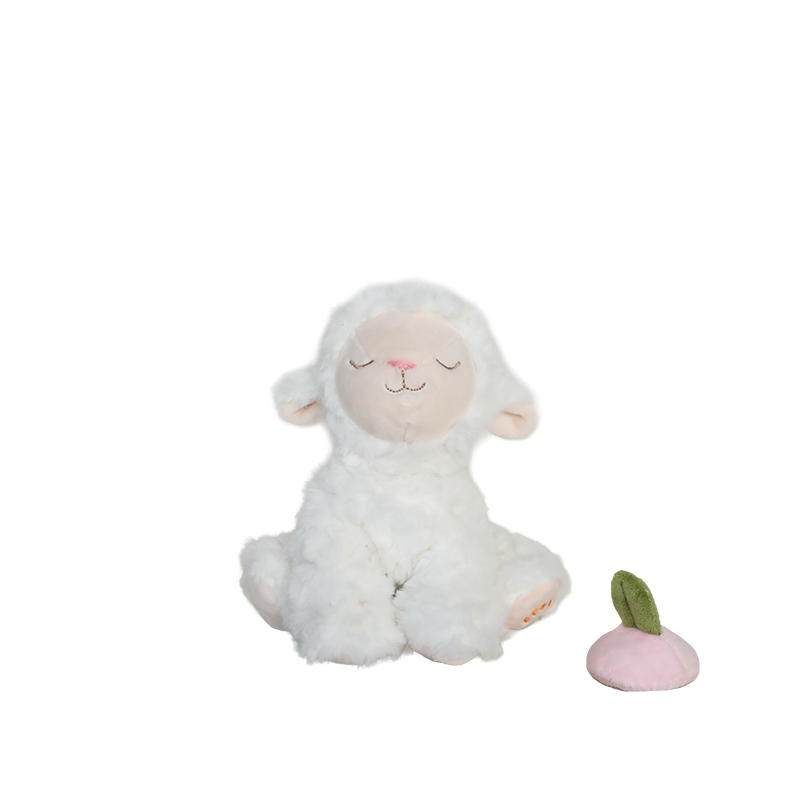 White plush lamb toy with a small pink peach  on a white background