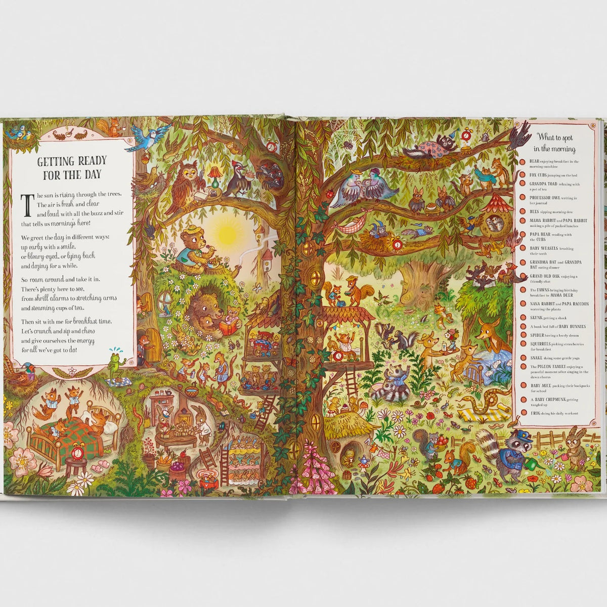 Illustrated book open to a page with a colorful tree and various characters, on a white background.