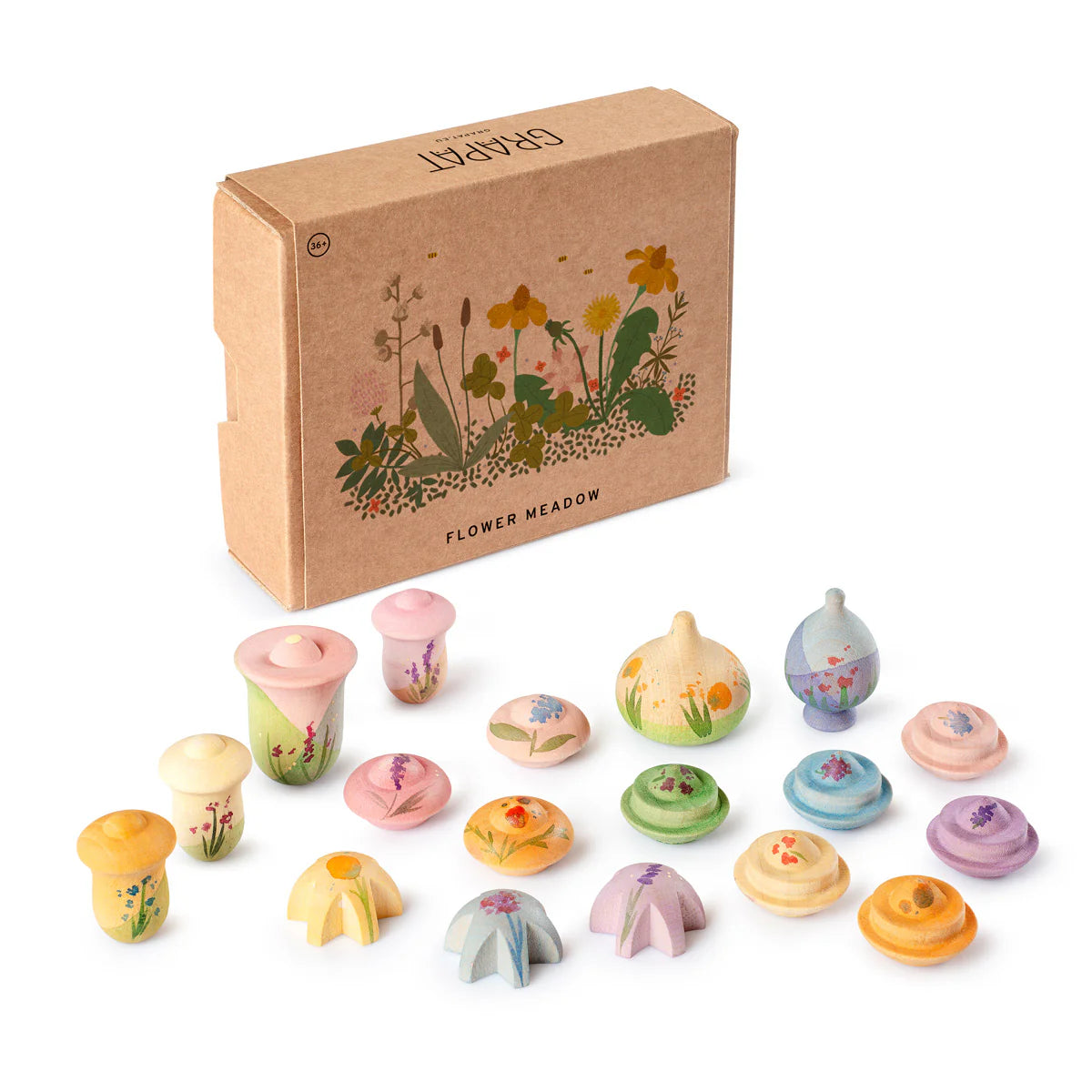 Set of small, colorful wooden flowers in front of a cardboard box with floral design and grapat branding.
