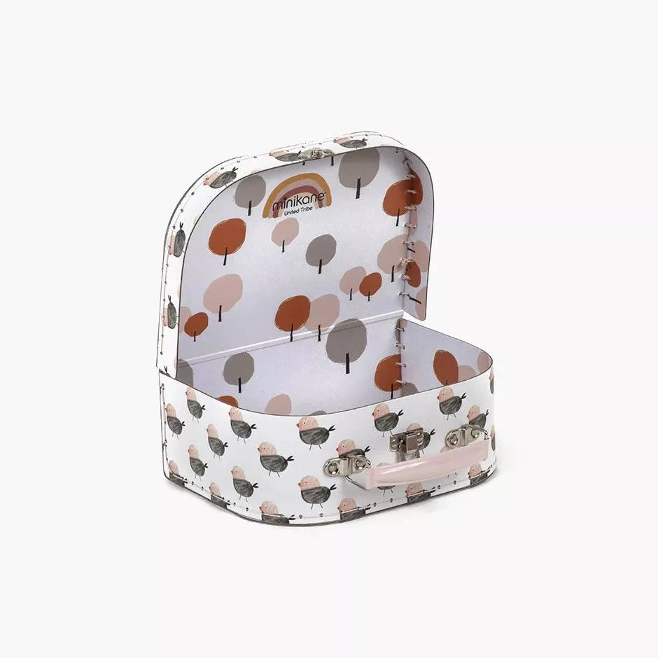 Children&#39;s toy suitcase with tree and bird pattern on a white background