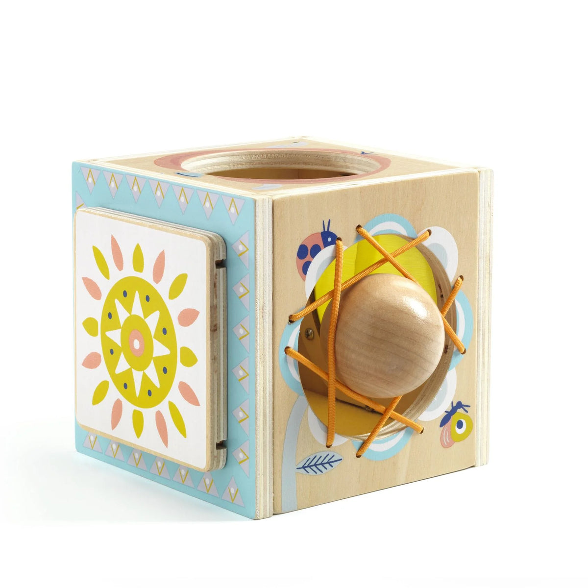 Wooden toy block with designs on a white background
