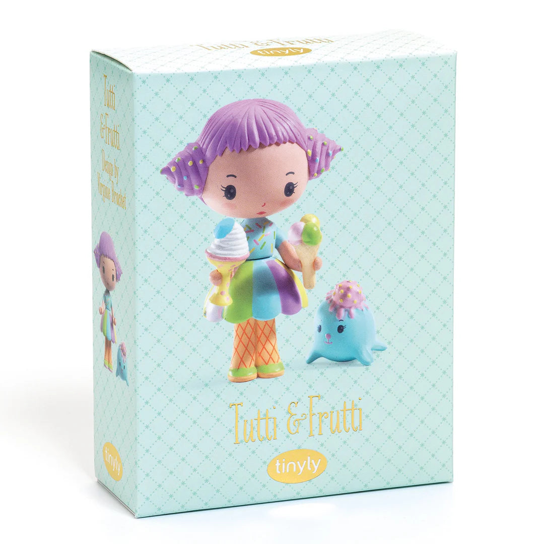 Toy figure with purple hair and ice cream cone on a blue box packaging, featuring 'Tutti & Frutti' branding.