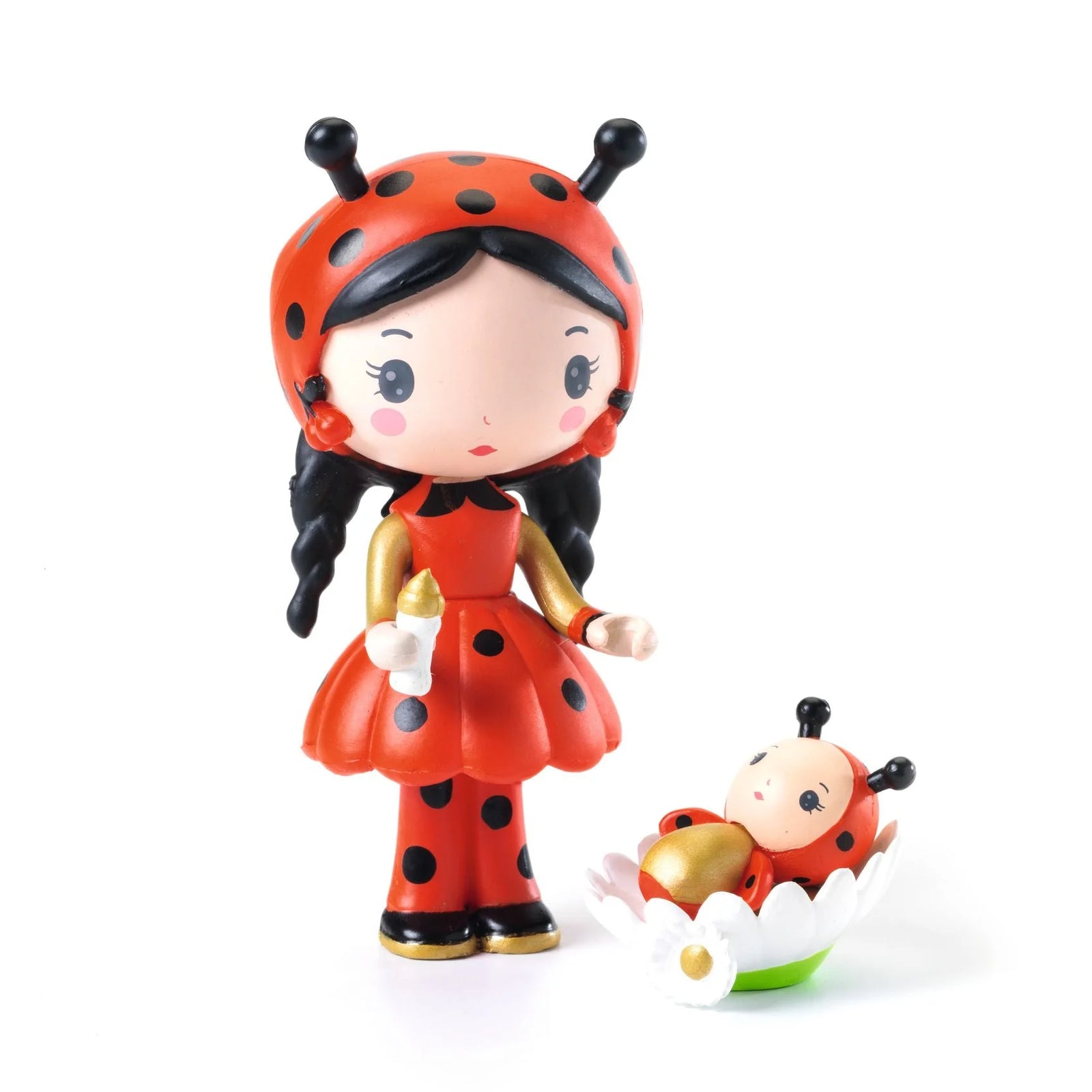 Toy figure of a ladybug girl with a smaller figure on a white background