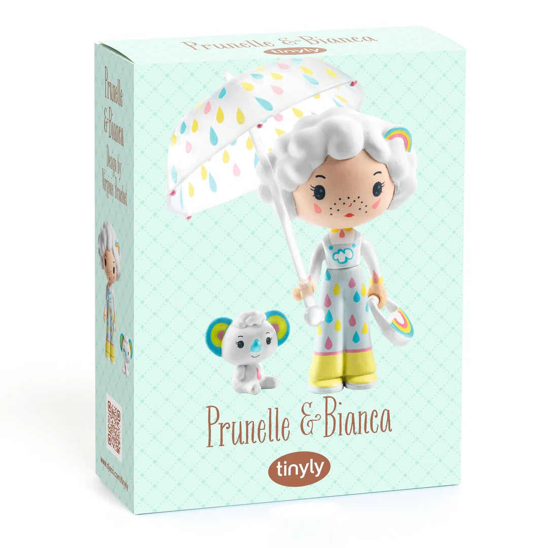 Toy figure with colorful umbrella and matching toy on a white background