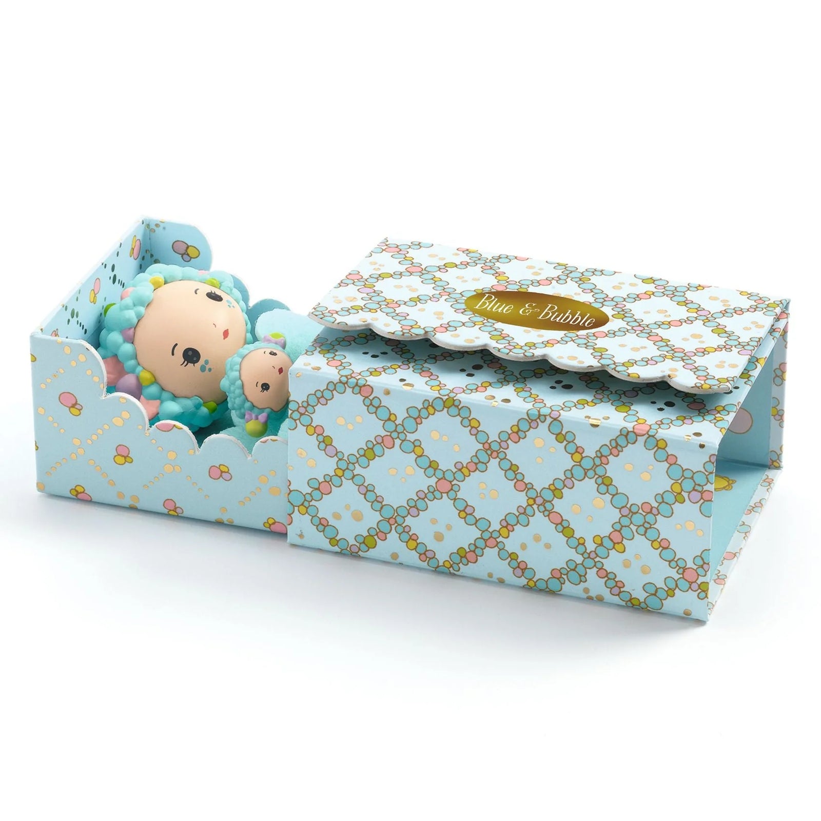Toy figure in a decorative box with bubble-themed design on a white background