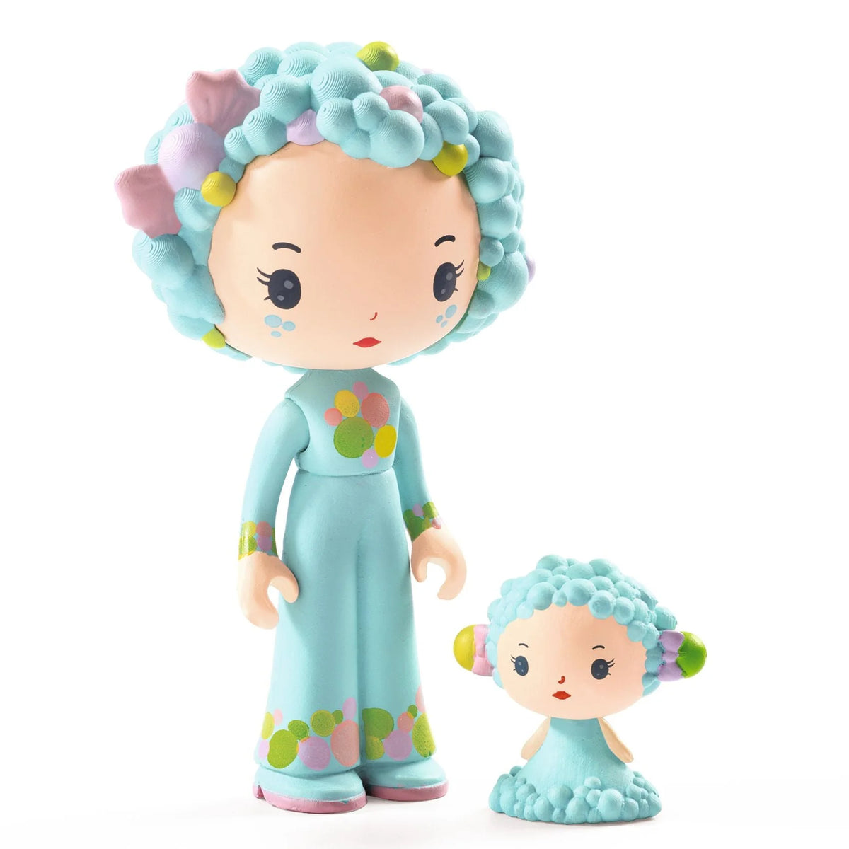 Two colorful figurines with turquoise hair and floral patterns on a white background