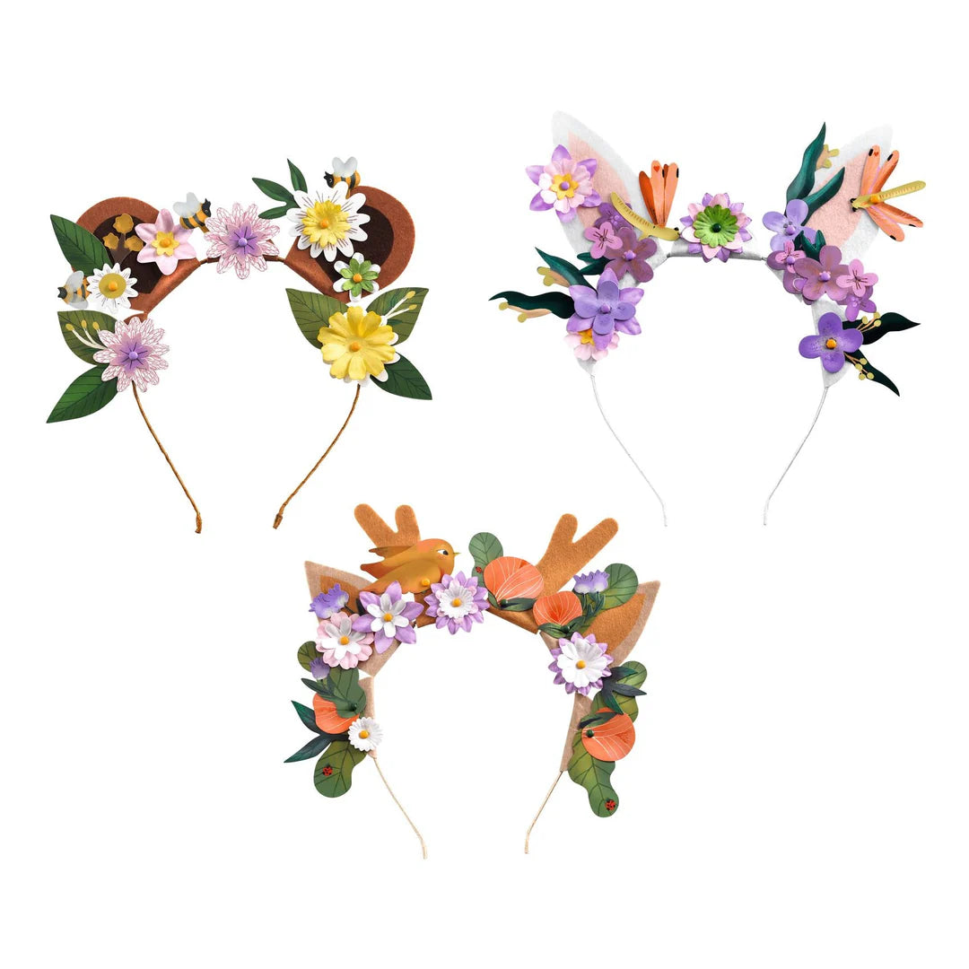 Three decorative headbands with floral and animal designs on a white background