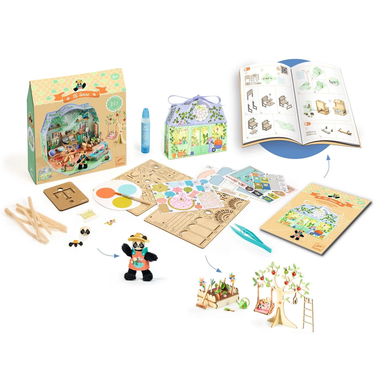 Children's craft kit with wooden pieces, markers, and a book on a white background