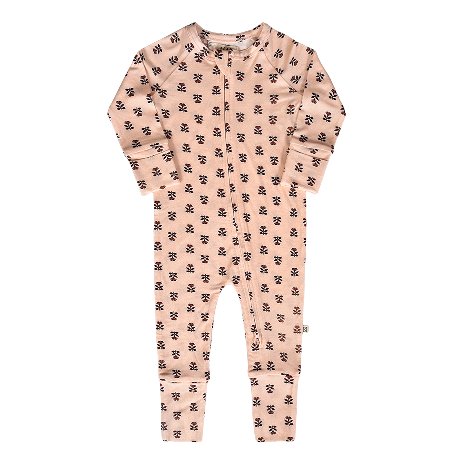 Woman holding a baby with a blurred natural background