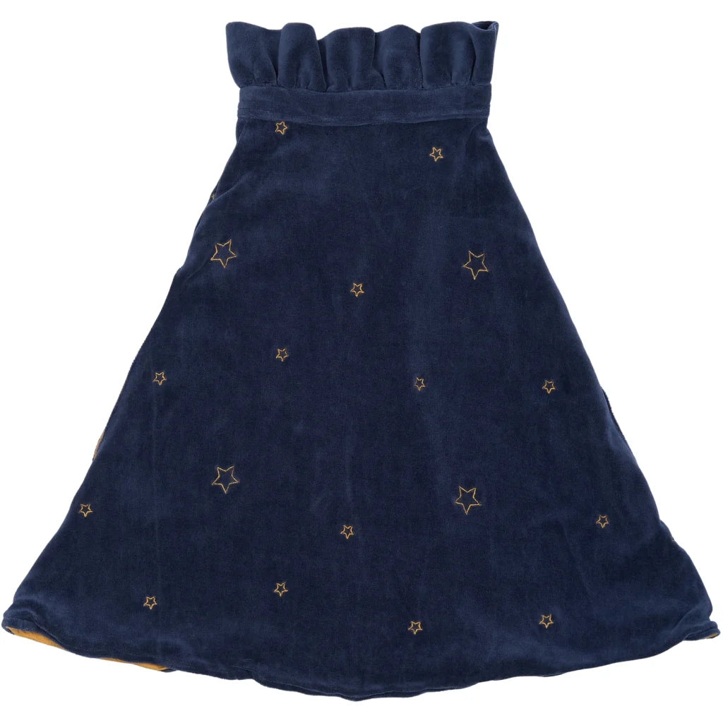 Navy blue cape with star patterns on a white background