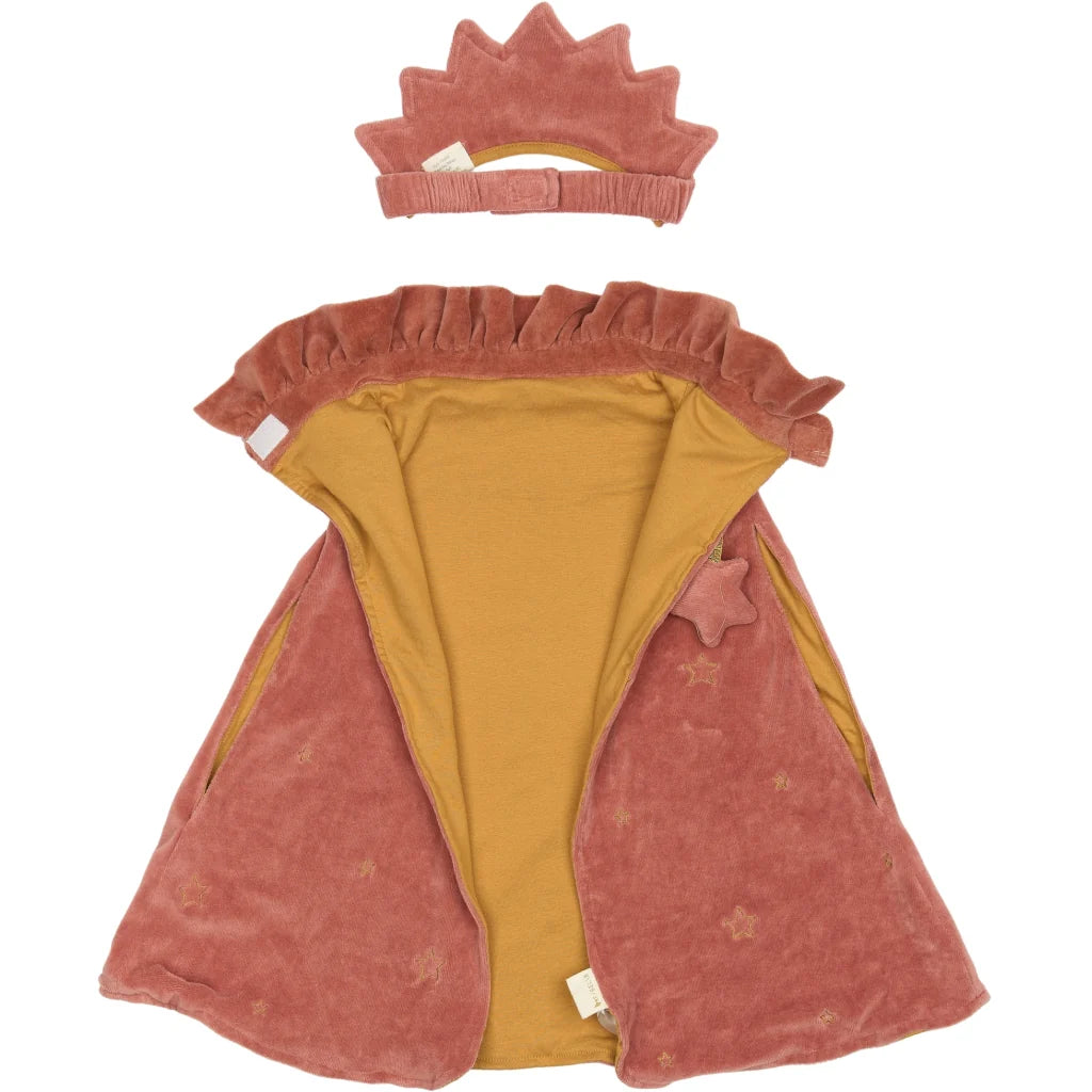 Children's costume with pink cape and crown on a white background