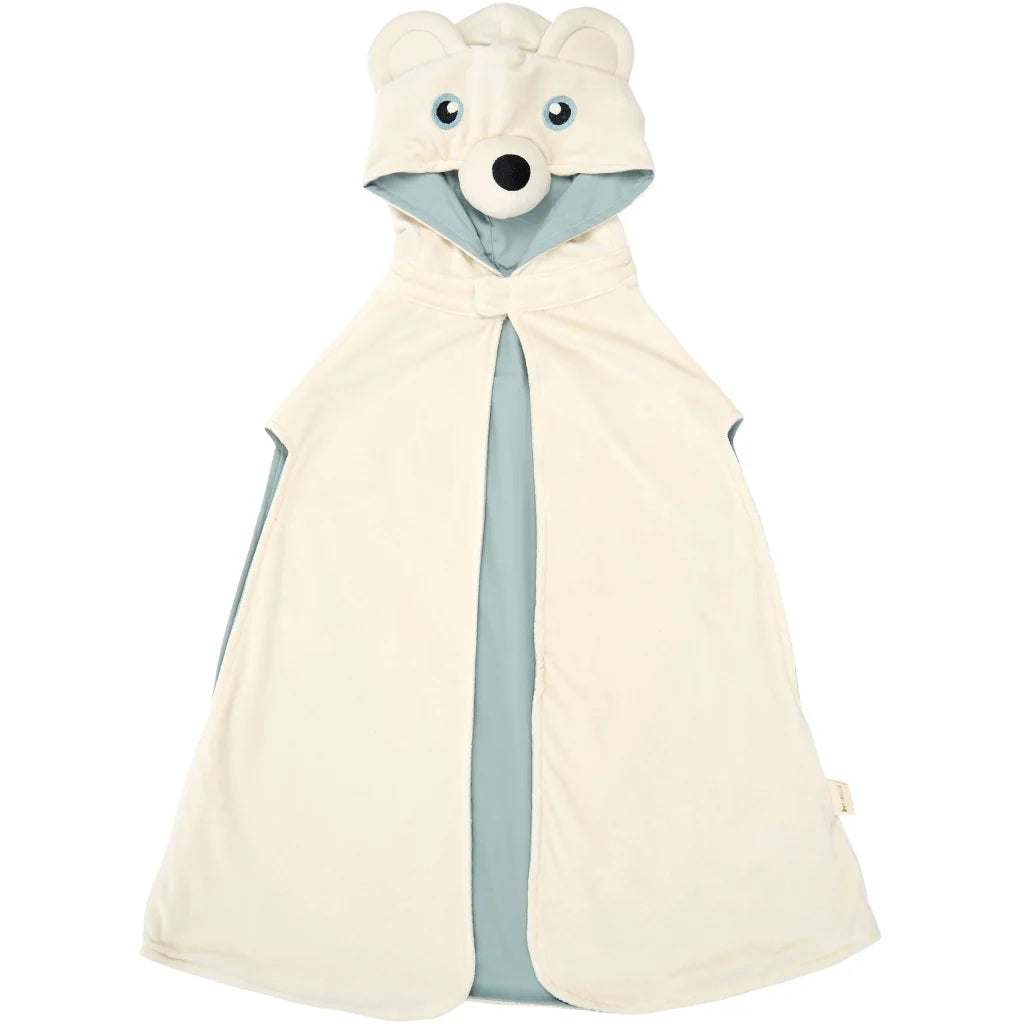 A cream-colored hooded cape with a bear face design on the hood, featuring light blue lining and side panels, shown against a plain white background.
