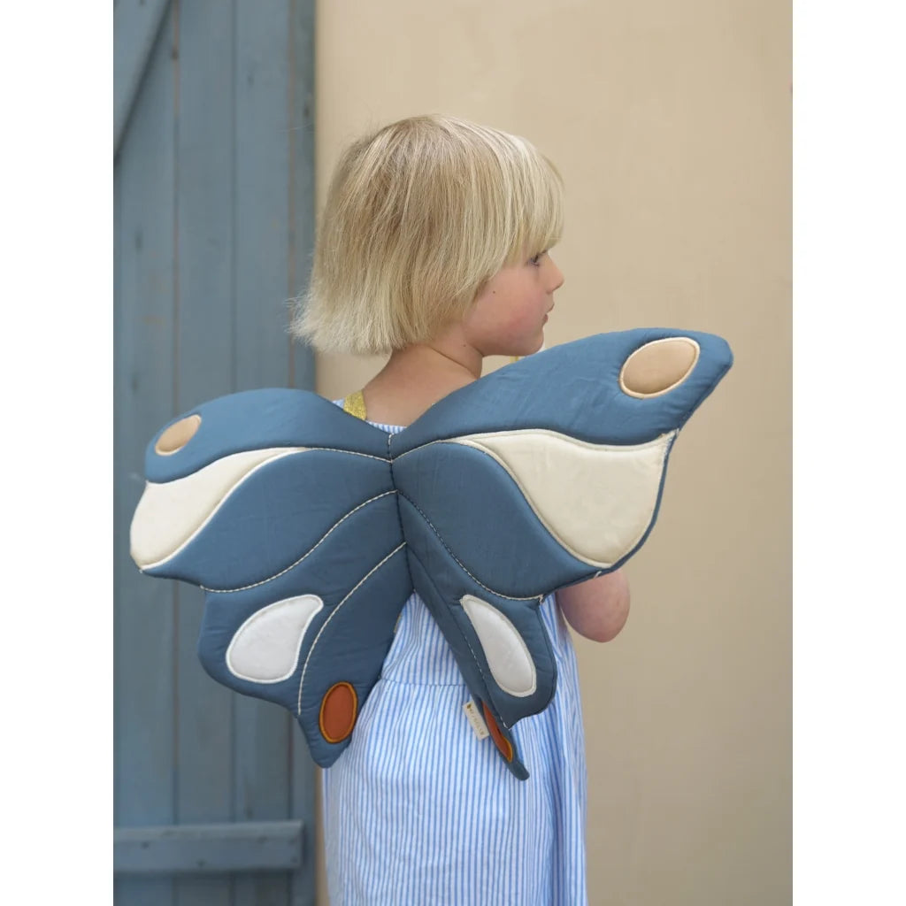 Butterfly-shaped wings with brown accents on a white background