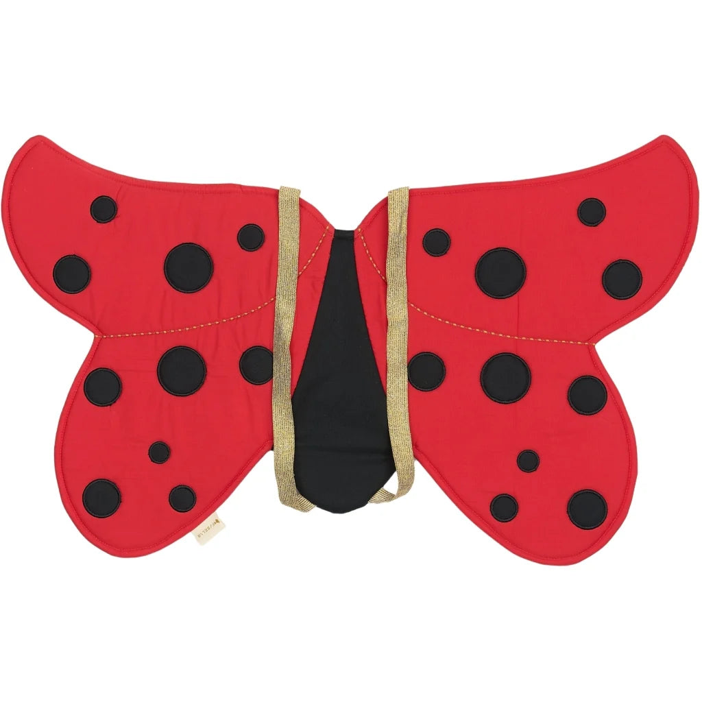 A red ladybug costume wing accessory with black polka dots and gold trim, shown against a plain white background.