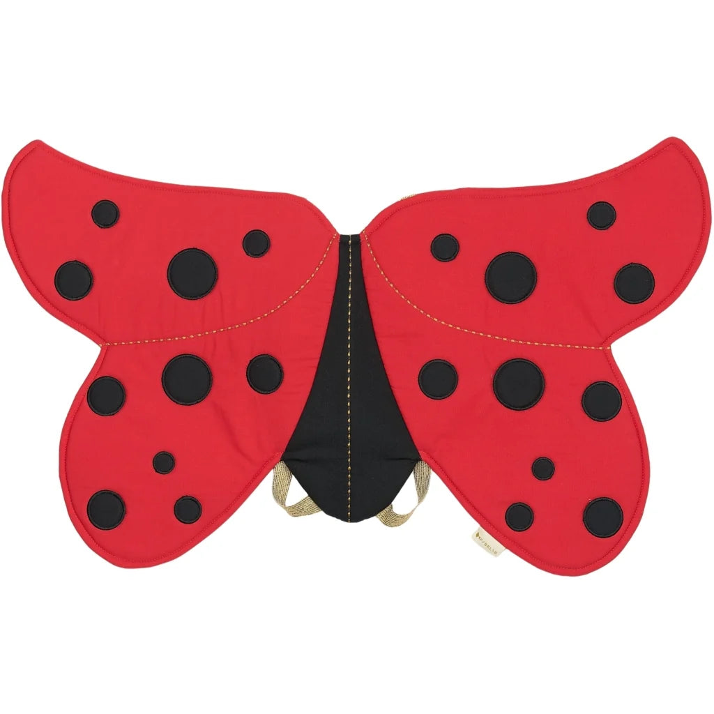 Red ladybug costume wings with black spots on a white background