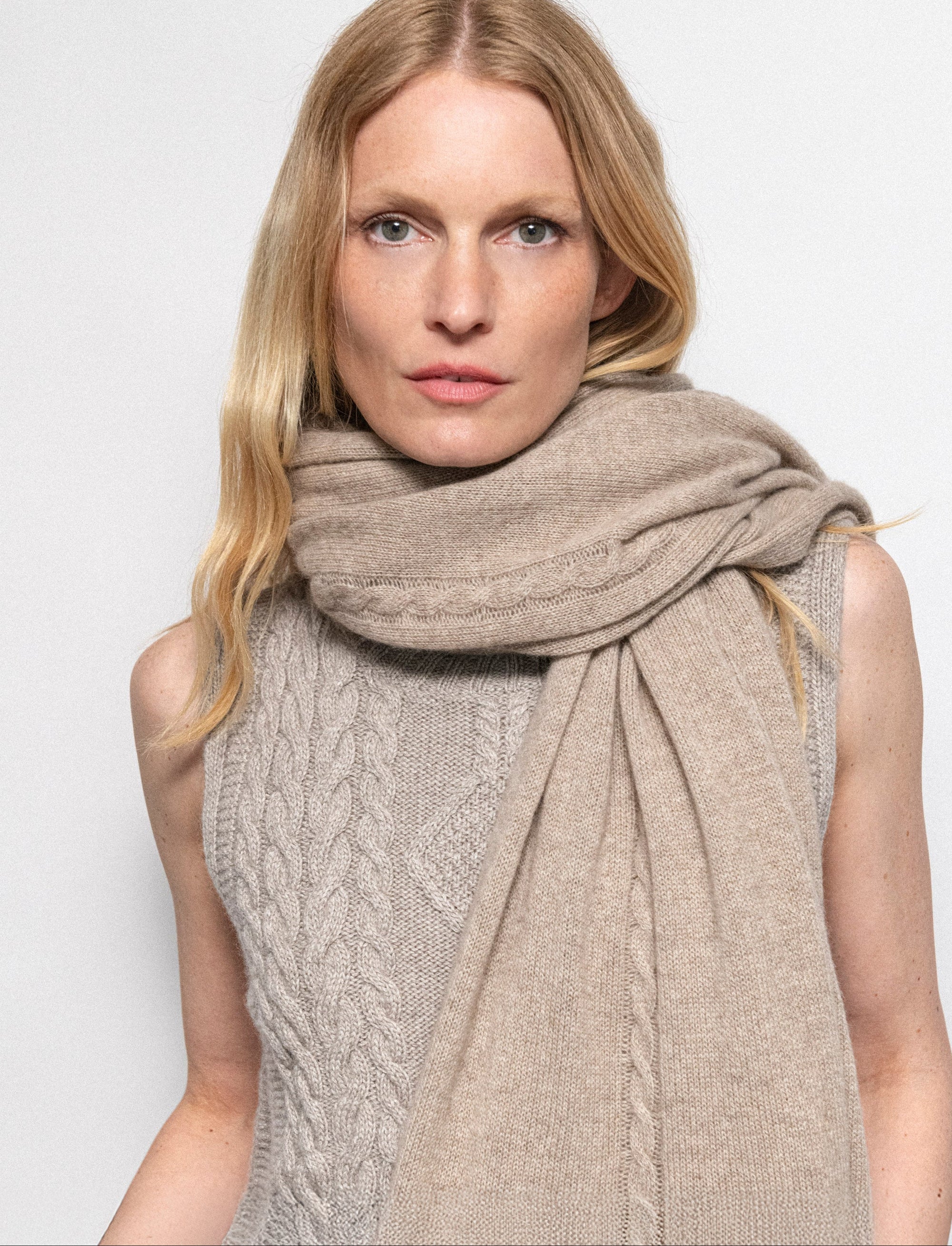 Taupe cashmere wrap on a white background