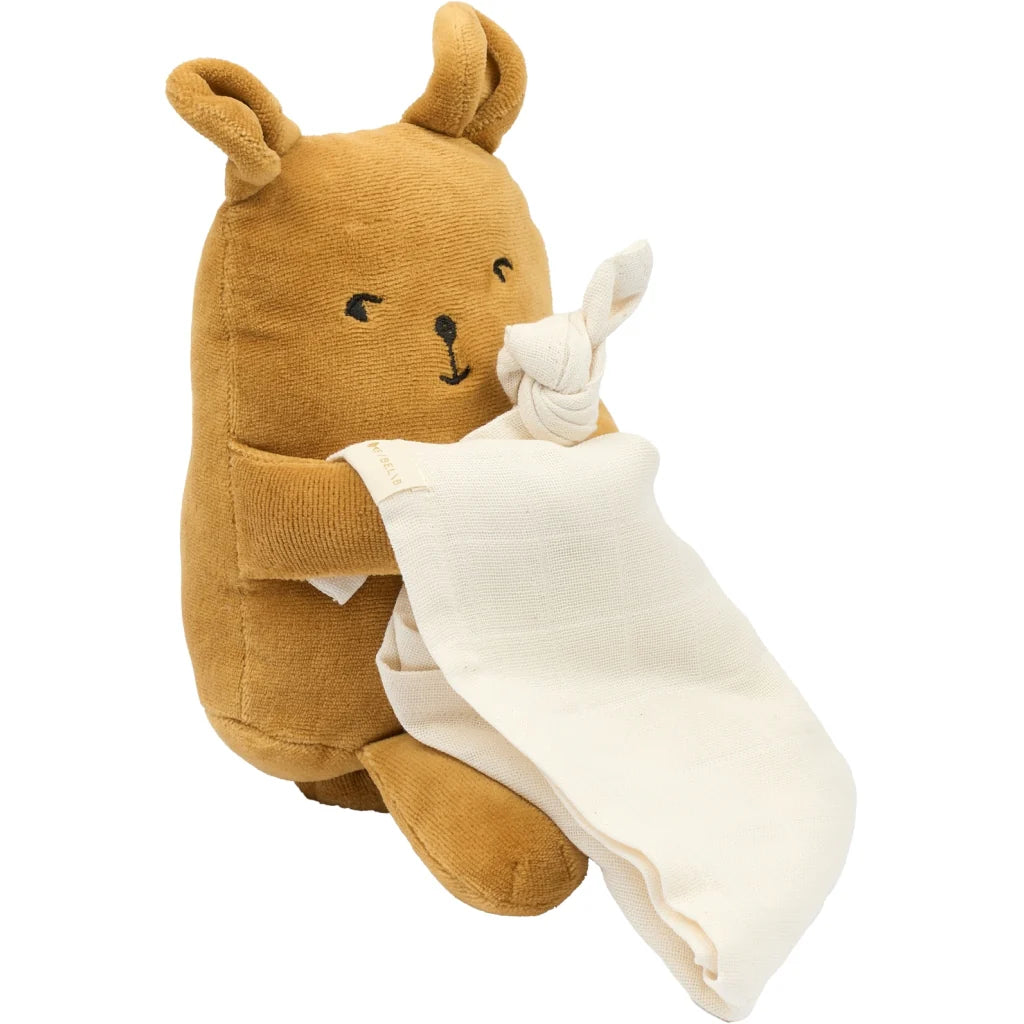 Brown plush toy resembling a bear holding a white blanket on a white background
