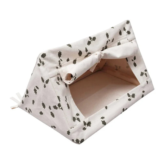 Triangle-shaped doll tent with floral pattern on a white background