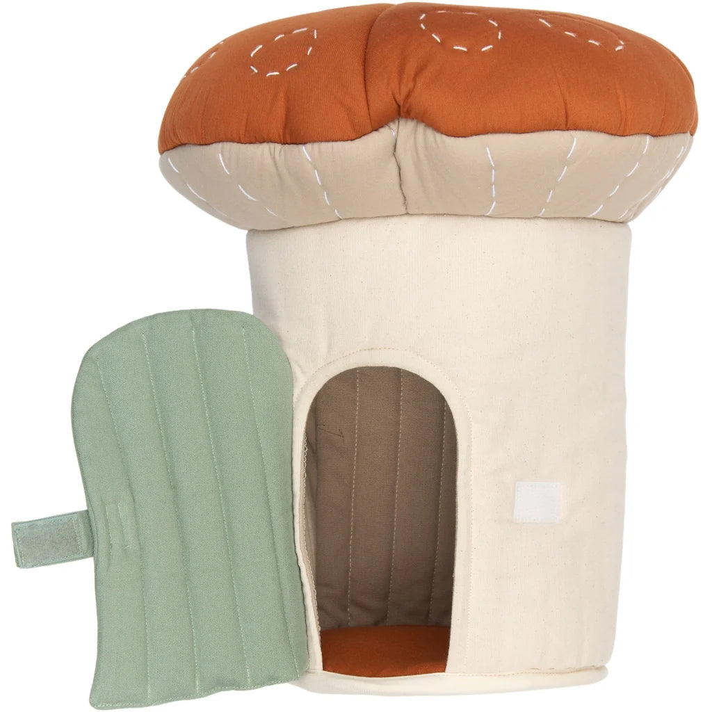 Mushroom-shaped house with a green door on a white background