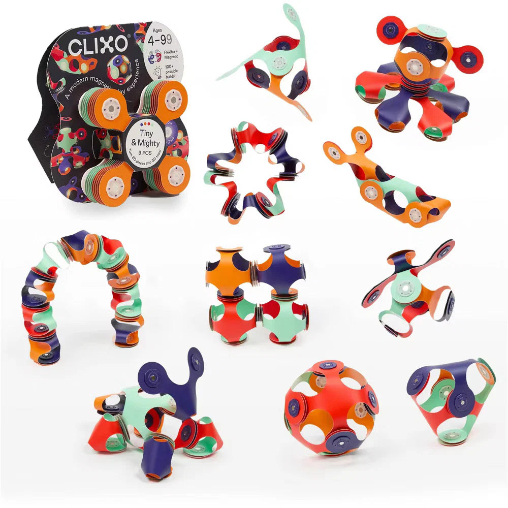 Colorful magnetic building toys with packaging on a white background