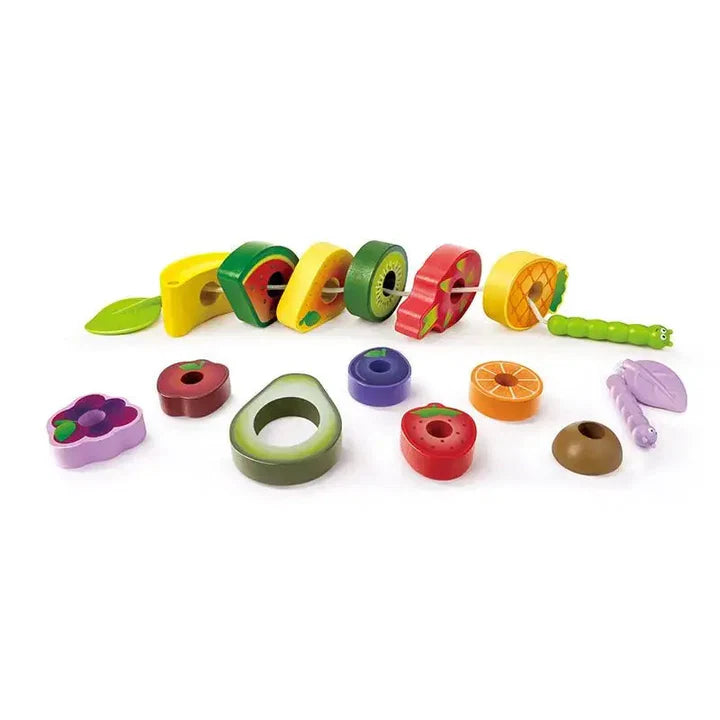 Colorful toy set with various shaped pieces on a white background