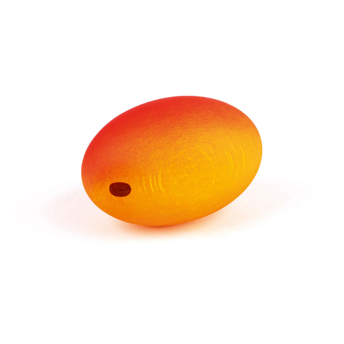 Orange and red spherical wooden mango on a white background