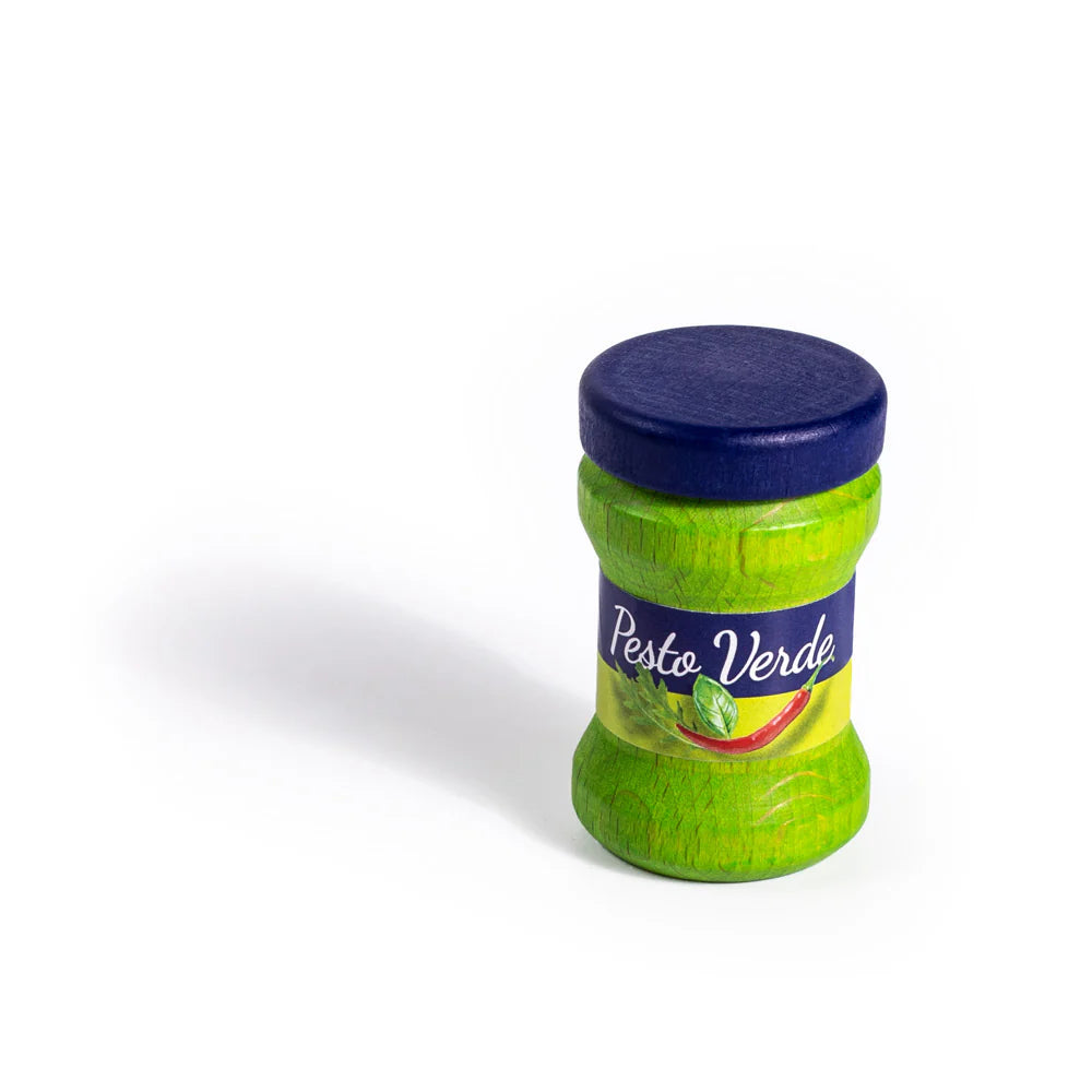 Jar of Pesto Verde with a blue lid on a white background