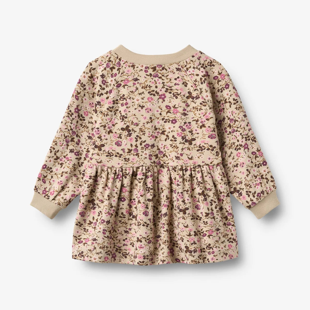 A long-sleeve baby dress with a beige base and a dense pink and brown floral print, featuring a gathered waist seam and ribbed cuffs.