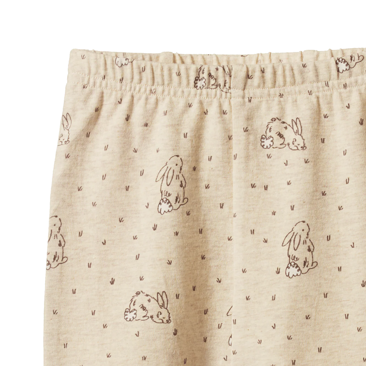 Beige fabric with rabbit pattern on a white background