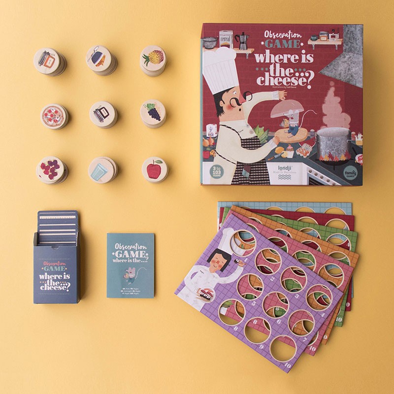 Board game components including cards, pieces, and a box on a yellow background