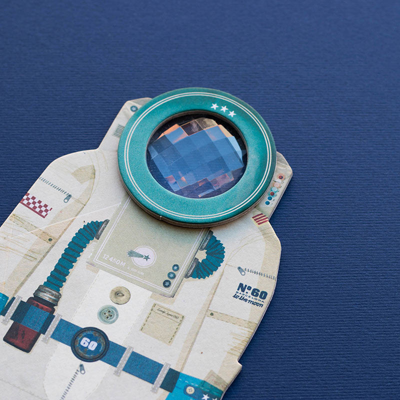 Close-up of  an astronaut suit on a blue background