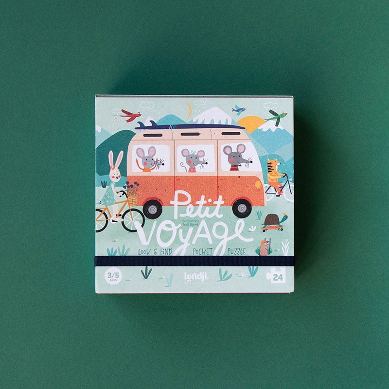 Children's puzzle box with cartoon design on a green background