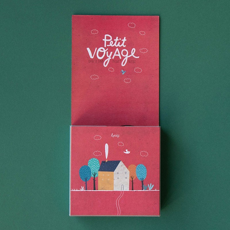 Red packaging with 'Petit Voyage' text on a green background