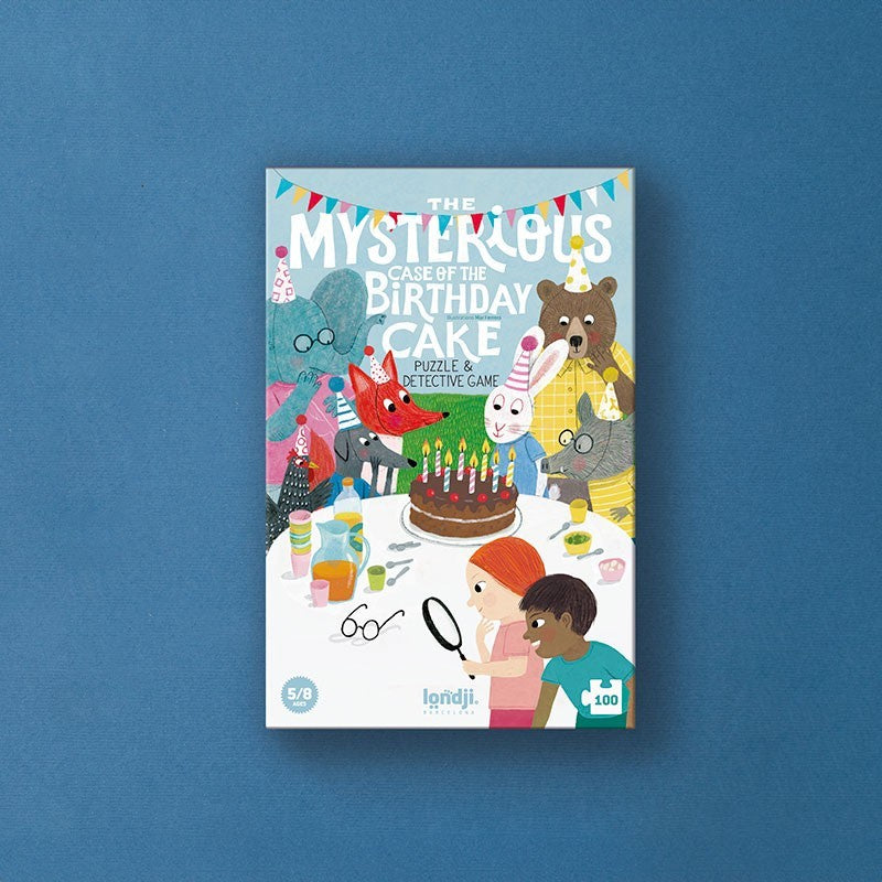 Puzzle cover of 'The Mysteries: Case of the Birthday Cake' with colorful illustrations on a blue background