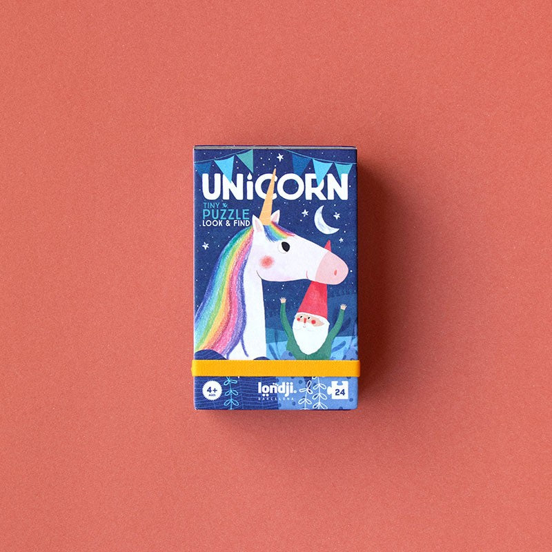 Unicorn-themed puzzle box on a red background