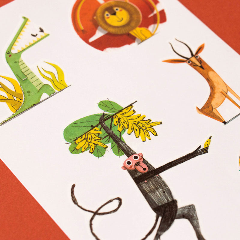 A collection of temporary tattoos featuring various jungle animals, displayed on a orange background. The tattoos include a lion, giraffe, rhino, and others.