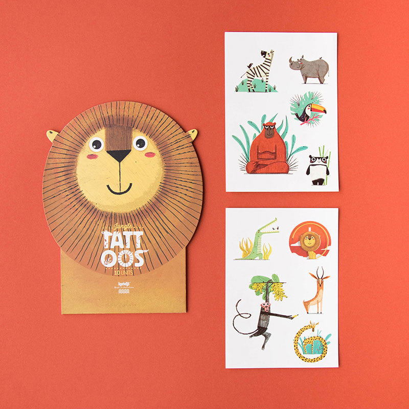 A collection of temporary tattoos featuring various jungle animals, displayed on a orange background. The tattoos include a lion, giraffe, rhino, and others.