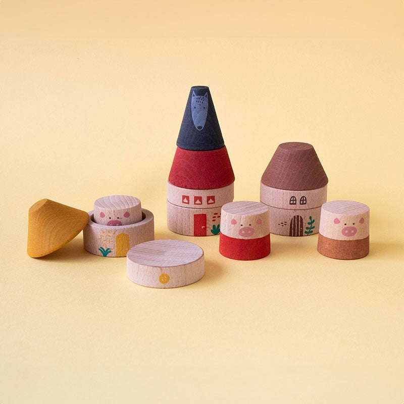 Set of colorful wooden toys on a yellow background